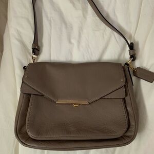 Coach dark tan

Coach Taylor Mini Shoulder / Crossbody Bag in Tan